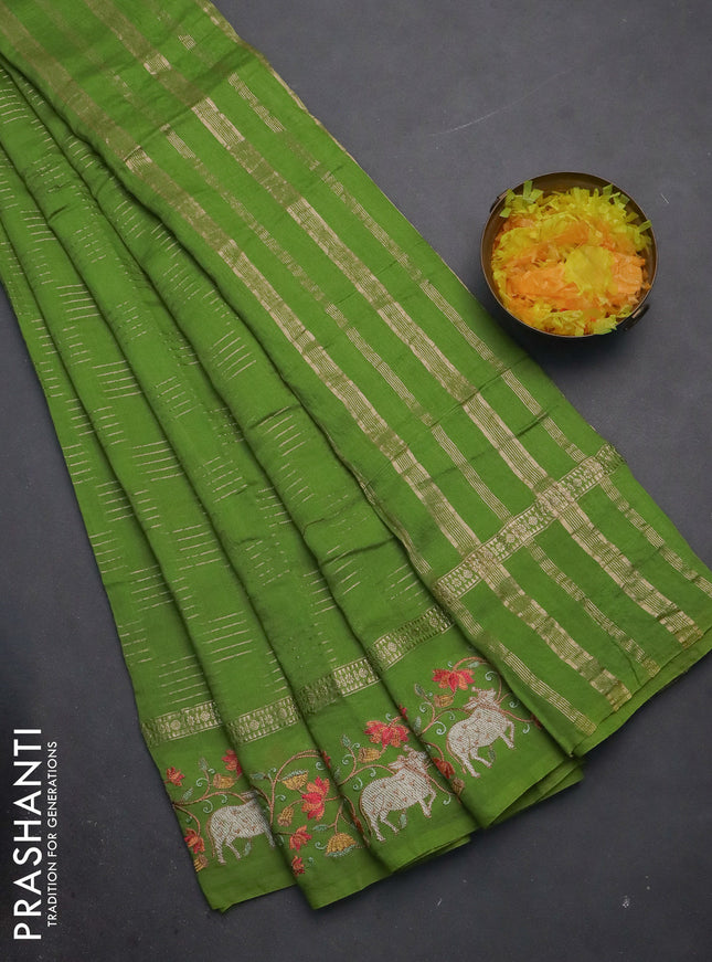 Semi chanderi saree light green with allover zari woven geometric weaves and pichwai embroidery border
