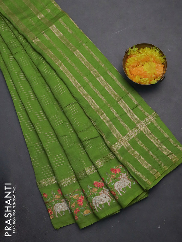 Semi chanderi saree light green with allover zari woven geometric weaves and pichwai embroidery border
