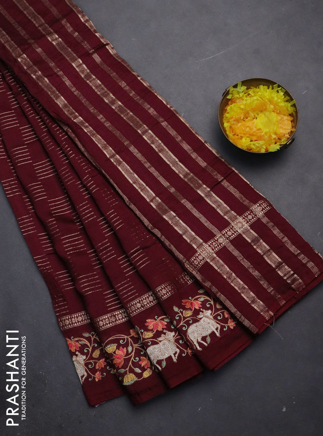 Semi chanderi saree maroon with allover zari woven geometric weaves and pichwai embroidery border