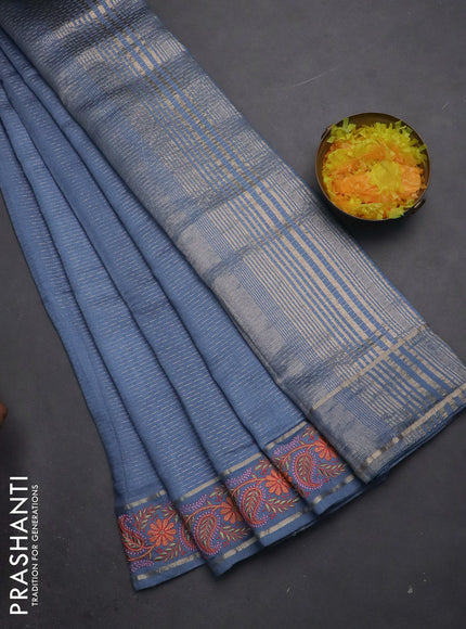 Semi chanderi saree pastel blue with allover zari woven stripes pattern and embroidery border