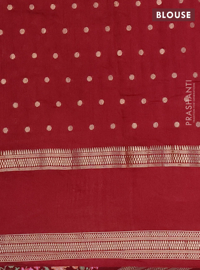 Semi chanderi saree maroon with allover zari woven buttas and floral embroidery border