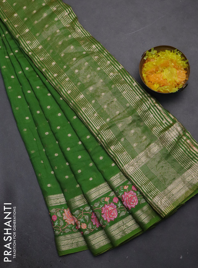 Semi chanderi saree light green with allover zari woven buttas and floral embroidery border