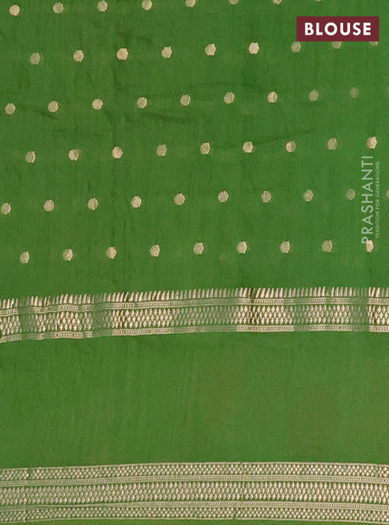 Semi chanderi saree light green with allover zari woven buttas and floral embroidery border