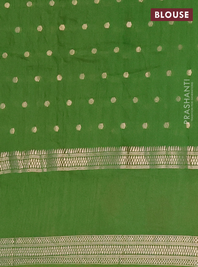 Semi chanderi saree light green with allover zari woven buttas and floral embroidery border