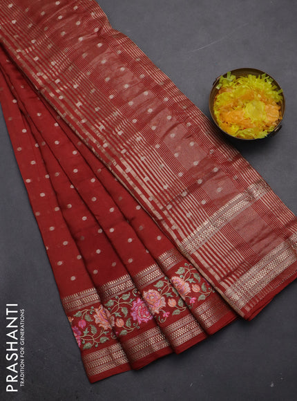 Semi chanderi saree rust shade with allover zari woven buttas and floral embroidery border