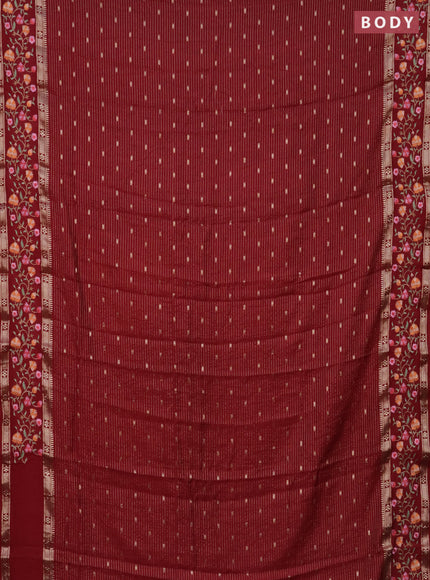 Semi chanderi saree maroon with allover zari weaves and floral embroidery border