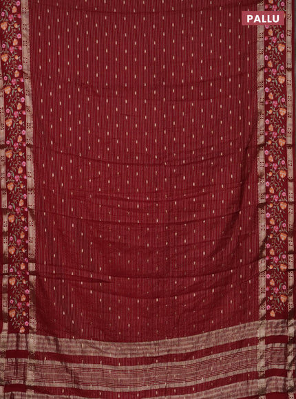 Semi chanderi saree maroon with allover zari weaves and floral embroidery border