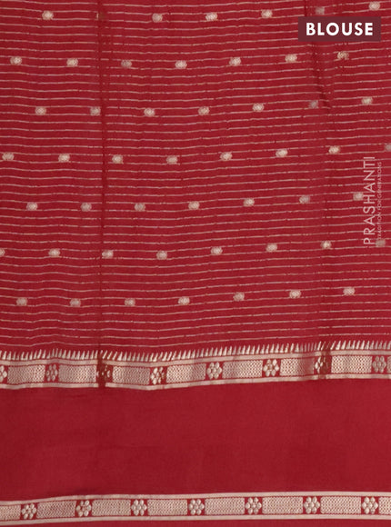 Semi chanderi saree maroon with allover zari weaves and floral embroidery border
