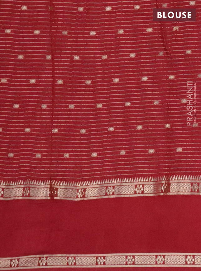 Semi chanderi saree maroon with allover zari weaves and floral embroidery border