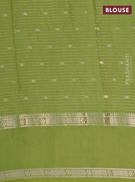 Semi chanderi saree light green with allover zari weaves and floral embroidery border