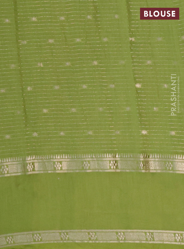 Semi chanderi saree light green with allover zari weaves and floral embroidery border