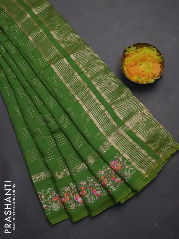 Semi chanderi saree light green with allover zari weaves and embroidery border