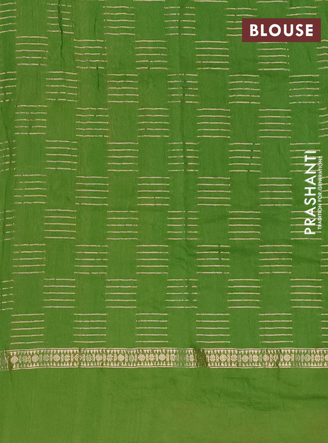 Semi chanderi saree light green with allover zari weaves and embroidery border