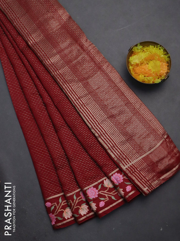 Semi chanderi saree maroon with allover zari weaves and floral embroidery border