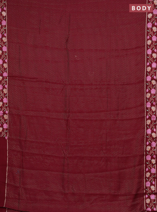 Semi chanderi saree maroon with allover zari weaves and floral embroidery border