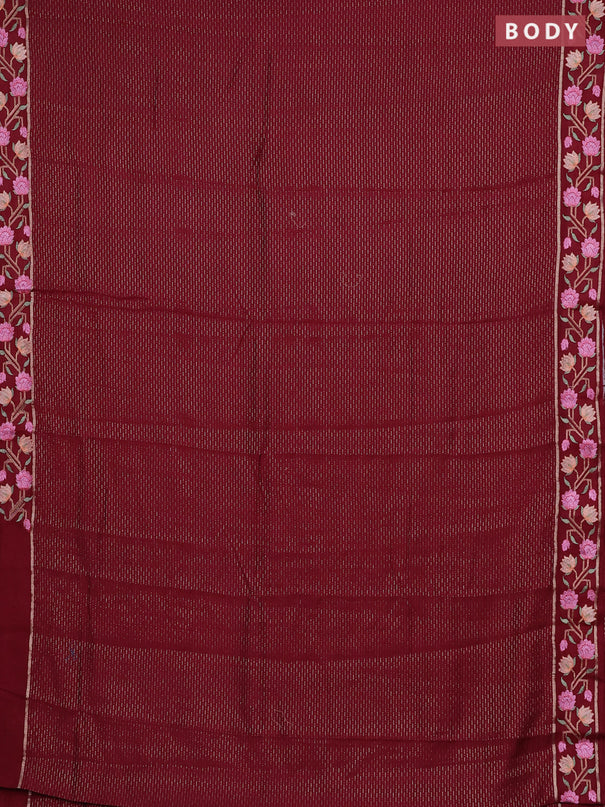 Semi chanderi saree maroon with allover zari weaves and floral embroidery border