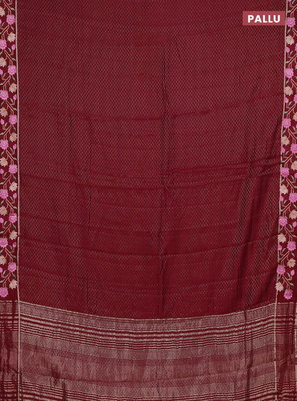 Semi chanderi saree maroon with allover zari weaves and floral embroidery border