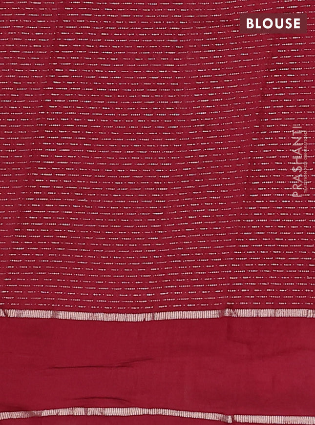 Semi chanderi saree maroon with allover zari weaves and floral embroidery border