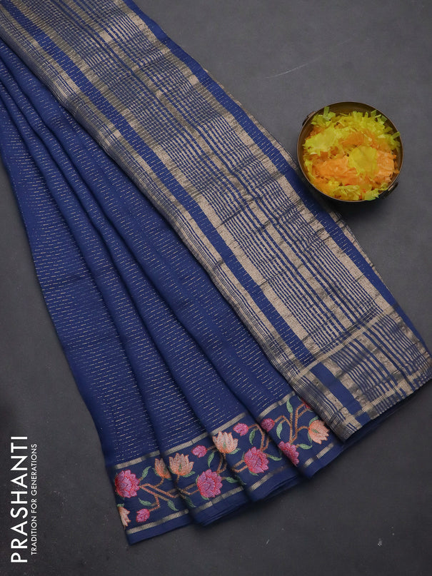 Semi chanderi saree blue with allover zari weaves and floral embroidery border