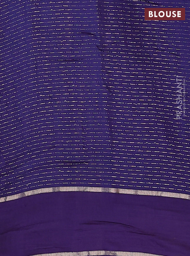 Semi chanderi saree blue with allover zari weaves and floral embroidery border