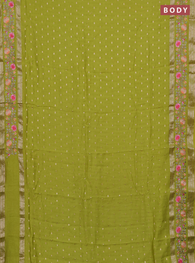 Semi chanderi saree fluorescent green with allover zari woven buttas and floral embroidery border