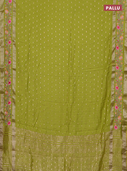 Semi chanderi saree fluorescent green with allover zari woven buttas and floral embroidery border