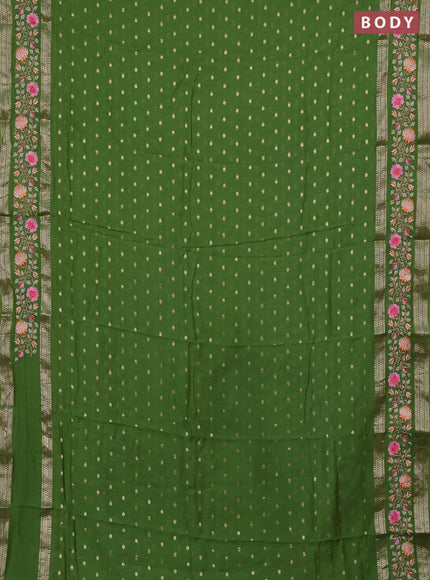 Semi chanderi saree light green with allover zari woven buttas and floral embroidery border