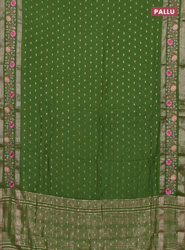 Semi chanderi saree light green with allover zari woven buttas and floral embroidery border