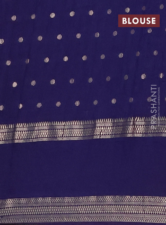 Semi chanderi saree dark blue with allover zari woven buttas and floral embroidery border