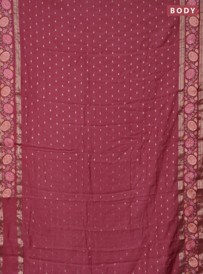Semi chanderi saree pink shade with allover zari woven buttas and floral embroidery border