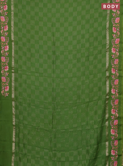 Semi chanderi saree green with allover zari woven geometric weaves and floral embroidery border