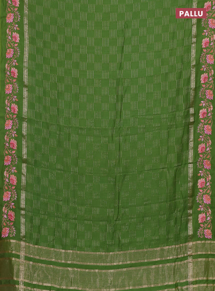 Semi chanderi saree green with allover zari woven geometric weaves and floral embroidery border