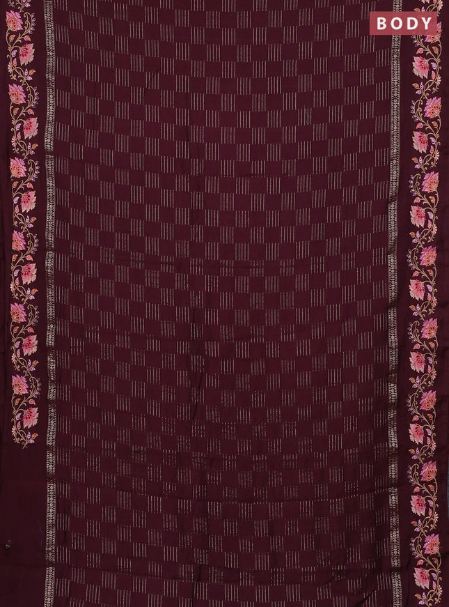 Semi chanderi saree deep maroon with allover zari woven geometric weaves and floral embroidery border