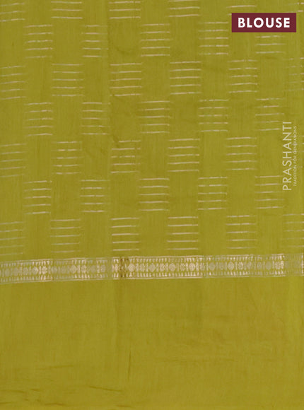 Semi chanderi saree lime green with allover zari woven geometric weaves and floral embroidery border