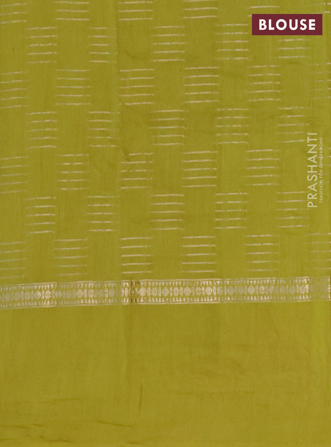 Semi chanderi saree lime green with allover zari woven geometric weaves and floral embroidery border