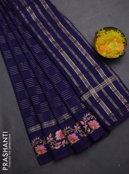 Semi chanderi saree dark blue with allover zari woven geometric weaves and floral embroidery border