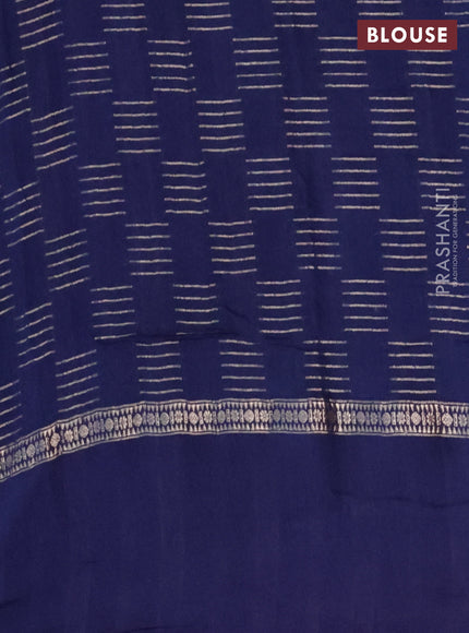 Semi chanderi saree dark blue with allover zari woven geometric weaves and floral embroidery border