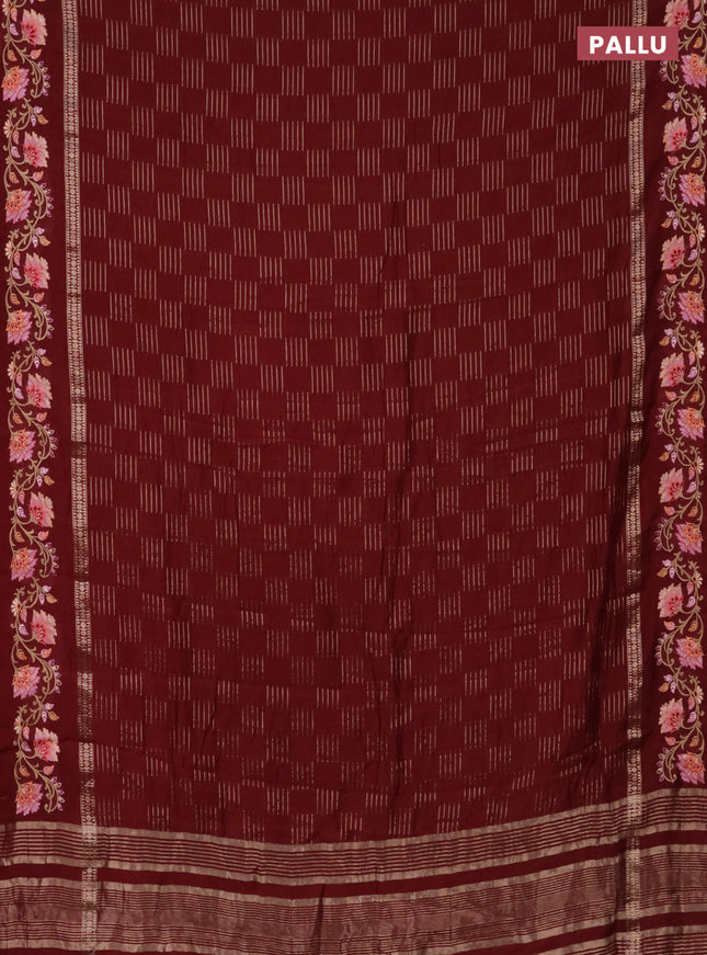 Semi chanderi saree maroon with allover zari woven geometric weaves and floral embroidery border