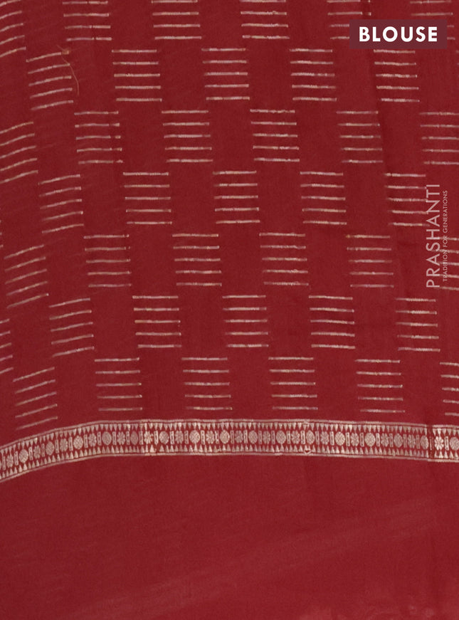 Semi chanderi saree maroon with allover zari woven geometric weaves and floral embroidery border