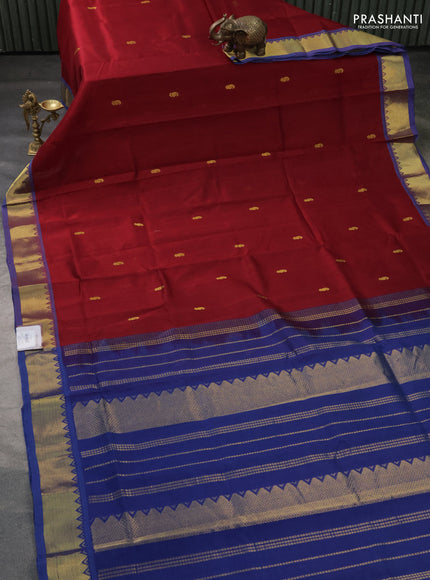 Silk cotton saree maroon and blue with paisley zari woven buttas and zari woven buttas