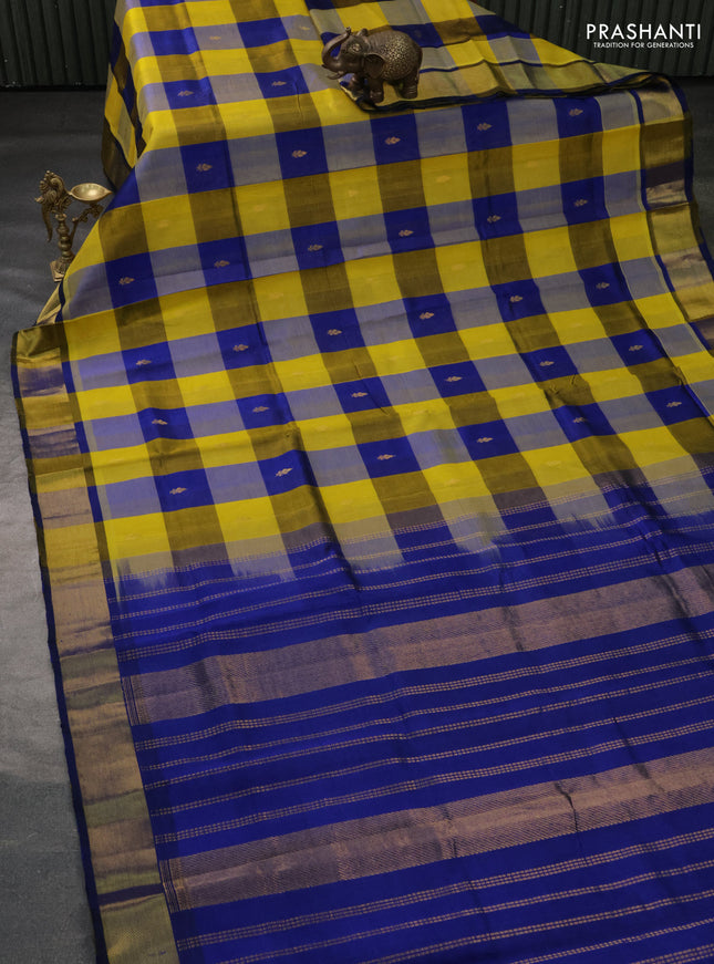 Silk cotton saree lime yellow and blue with allover paalum pazhamum checks & buttas and zari woven border