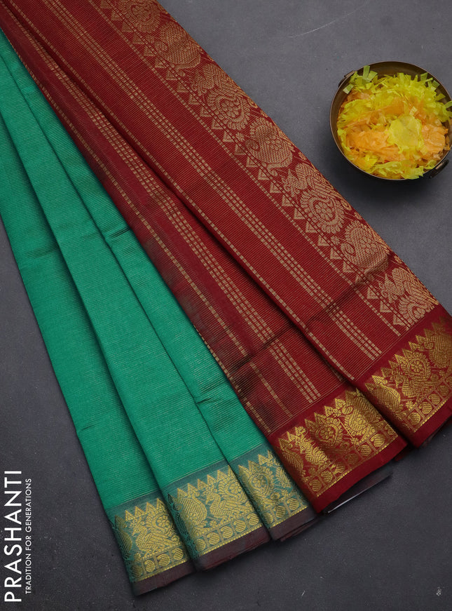 Silk cotton saree teal green and maroon with allover vairaosi pattern and zari woven border