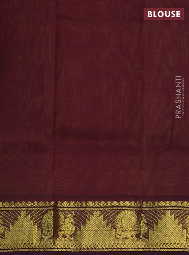Silk cotton saree dual shade of mustard yellow and deep maroon with paisley zari woven buttas and zari woven border