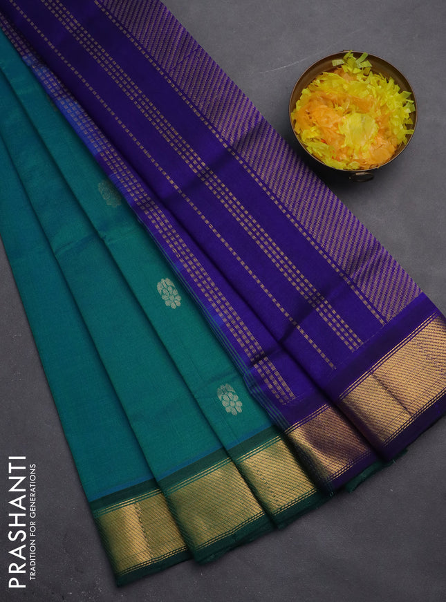 Silk cotton saree dual shade of teal green and blue with zari woven floral buttas and zari woven border