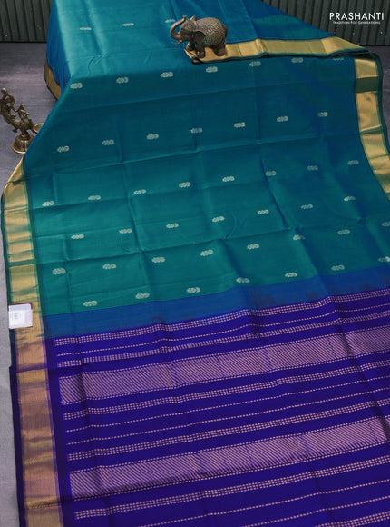 Silk cotton saree dual shade of teal green and blue with zari woven floral buttas and zari woven border