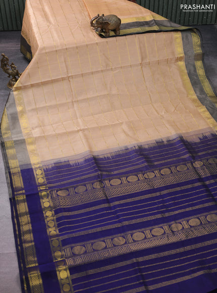 Silk cotton saree sandal and navy blue with allover zari checked pattern and rettapet zari woven border