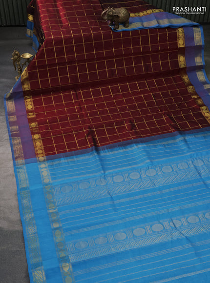 Silk cotton saree maroon and cs blue with allover zari checked pattern and rettapet zari woven border