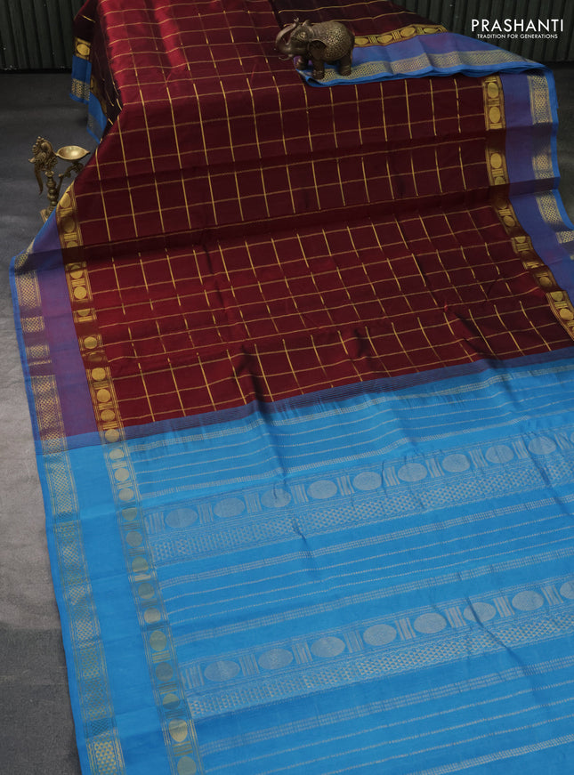 Silk cotton saree maroon and cs blue with allover zari checked pattern and rettapet zari woven border