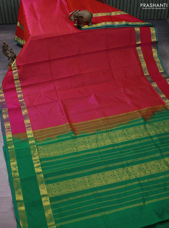 Silk cotton saree dual shade of pinkish orange and green with allover zari checks & lakshadeepam weaves and rettapet zari woven border