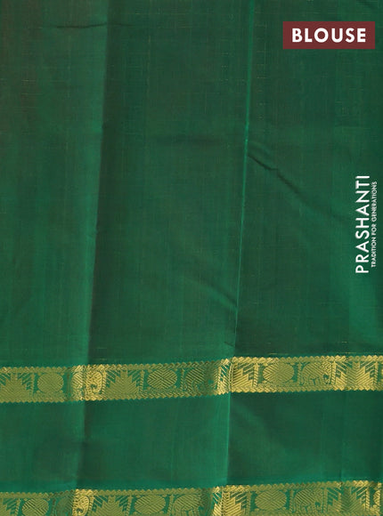 Silk cotton saree dual shade of pinkish orange and green with allover zari checks & lakshadeepam weaves and rettapet zari woven border